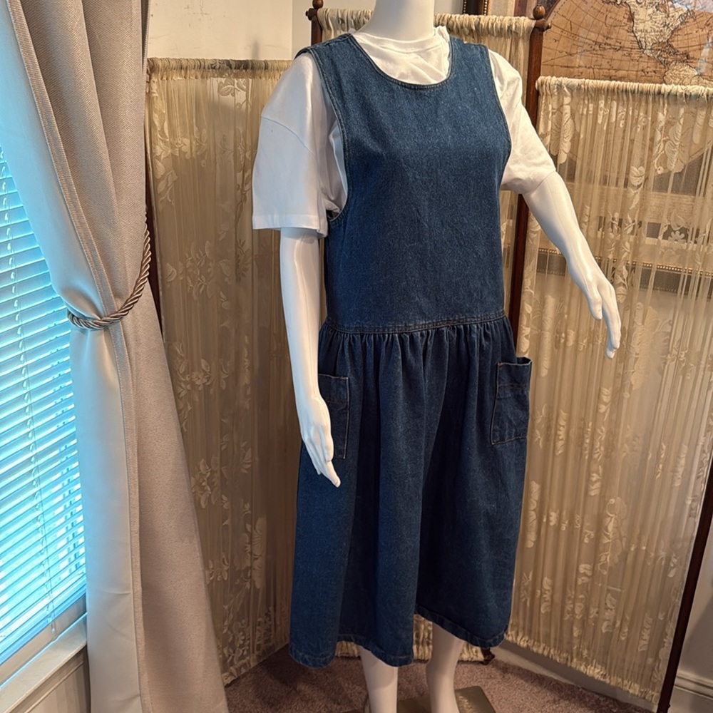 Blue Denim Dress. Size 12 TEE SHIRT not included .
 Two pockets Snaps
